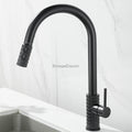 Modern kitchen sink mixer tap swivel spout detail view
