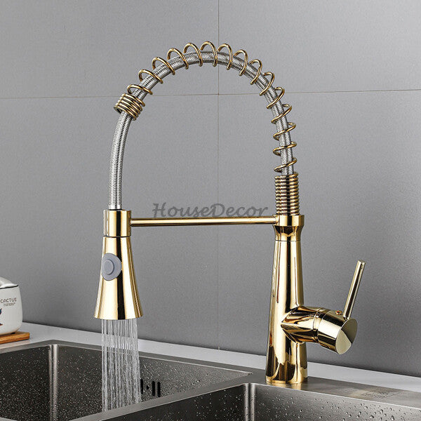 Gold kitchen sink mixer tap swivel spout detail view