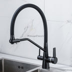 Modern kitchen sink mixer tap swivel spout detail view