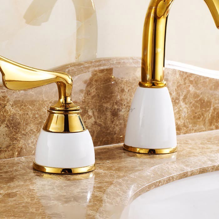 Gold Ceramic bathroom basin mixer tap 3 hole installation detail view