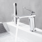 Black Brass bathroom basin mixer tap waterfall spout detail view