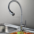 Modern kitchen sink mixer tap swivel spout detail view