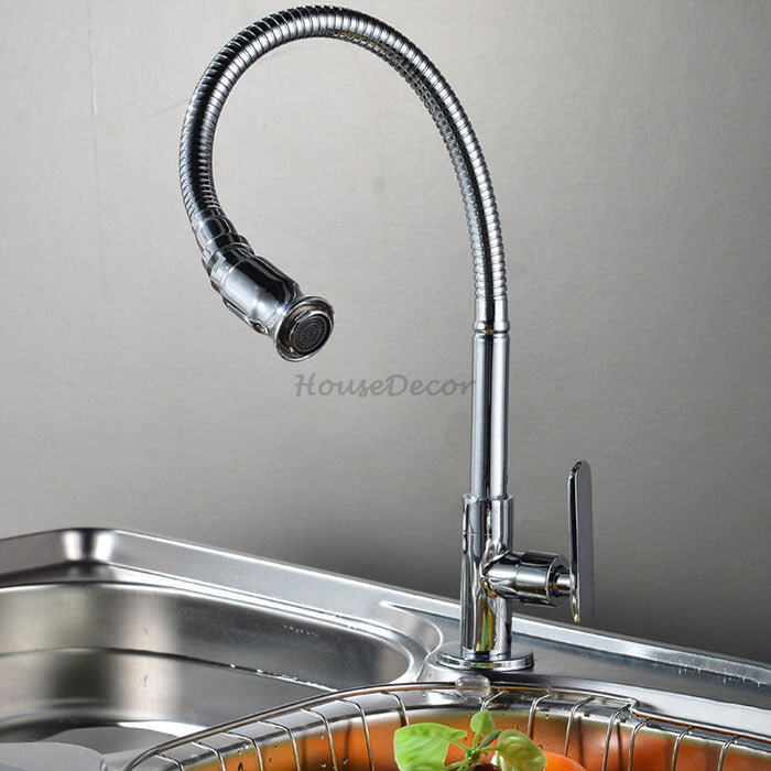 Modern kitchen sink mixer tap swivel spout detail view