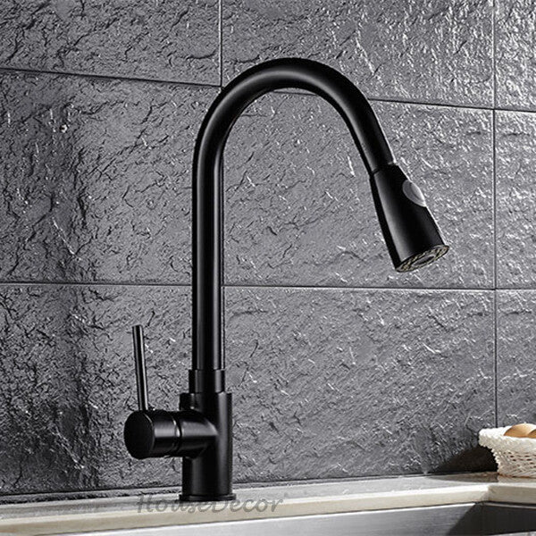 Black kitchen sink mixer tap pull out spray detail view