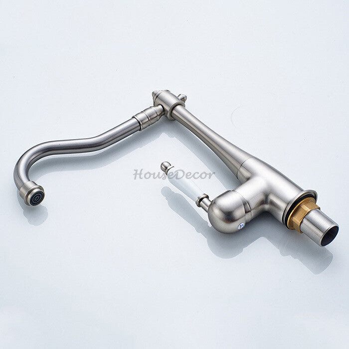 Modern kitchen sink mixer tap swivel spout detail view
