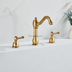 Brass bathroom basin mixer tap dual handle control detail view