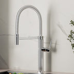 Modern kitchen sink mixer tap swivel spout detail view