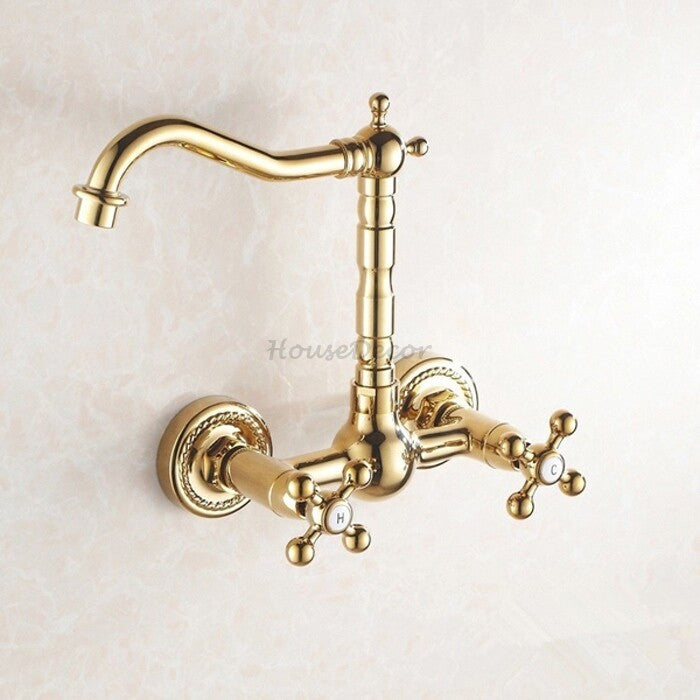 Gold kitchen sink mixer tap swivel spout detail view