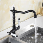 Black kitchen sink mixer tap swivel spout detail view