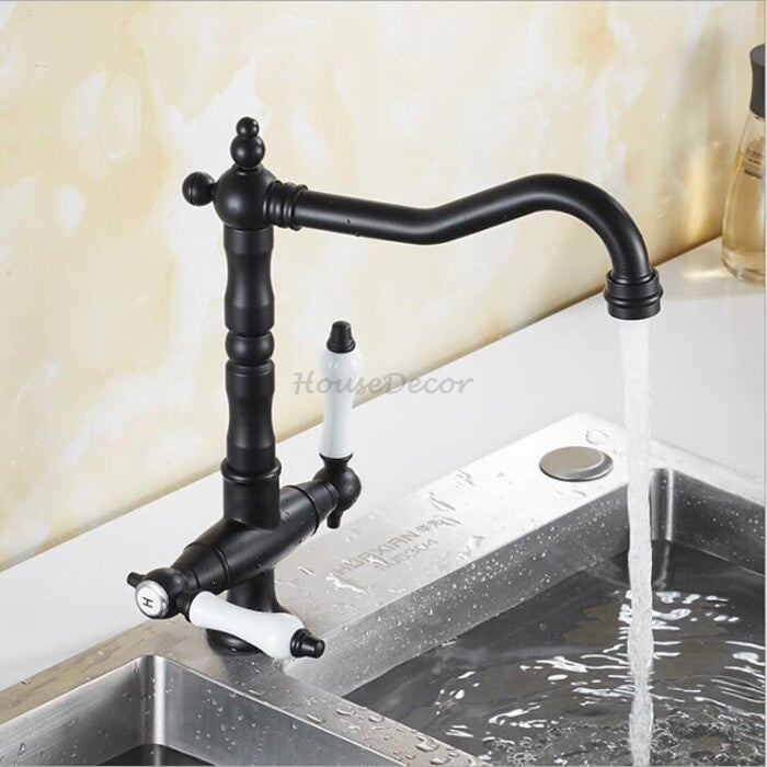 Black kitchen sink mixer tap swivel spout detail view