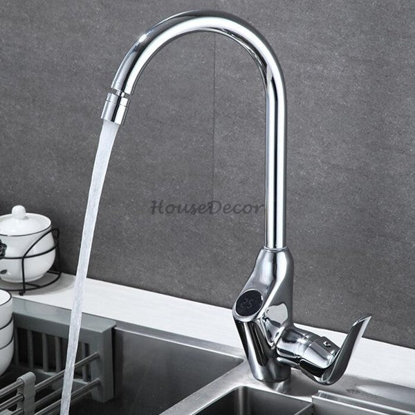 Modern kitchen sink mixer tap swivel spout detail view