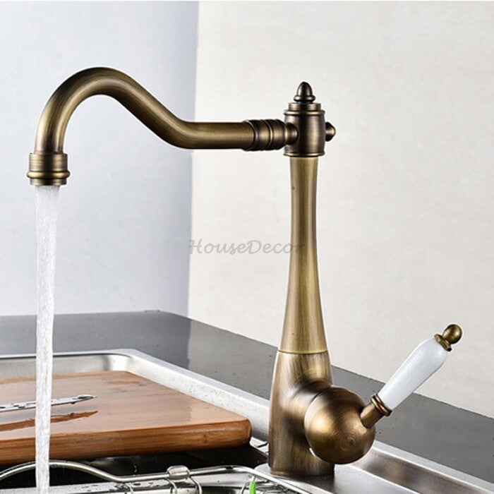 Modern kitchen sink mixer tap swivel spout detail view