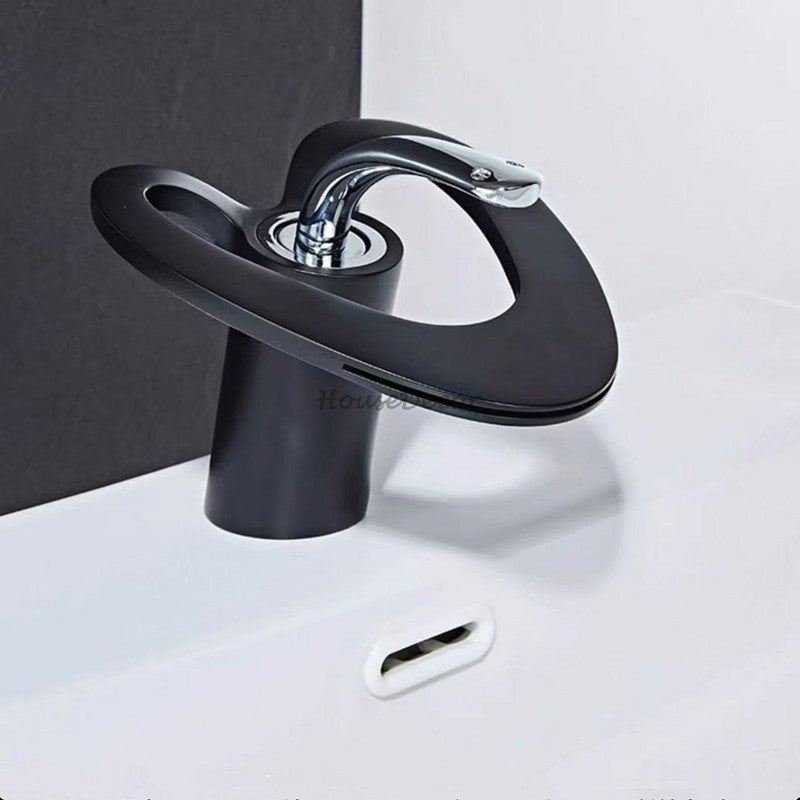 Modern bath shower mixer tap waterfall spout detail view