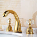 Gold bathroom basin mixer tap deck mounted design detail view