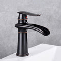 Black bathroom basin mixer tap waterfall spout detail view