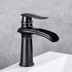 Black bathroom basin mixer tap waterfall spout detail view