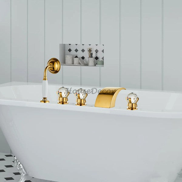 Gold bath shower mixer tap waterfall spout detail view
