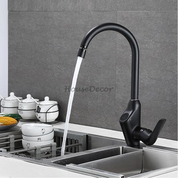 Modern kitchen sink mixer tap swivel spout detail view