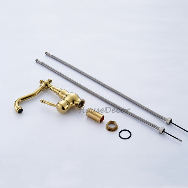 Gold bath shower mixer tap swivel spout detail view