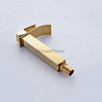 Gold bath shower mixer tap waterfall spout detail view
