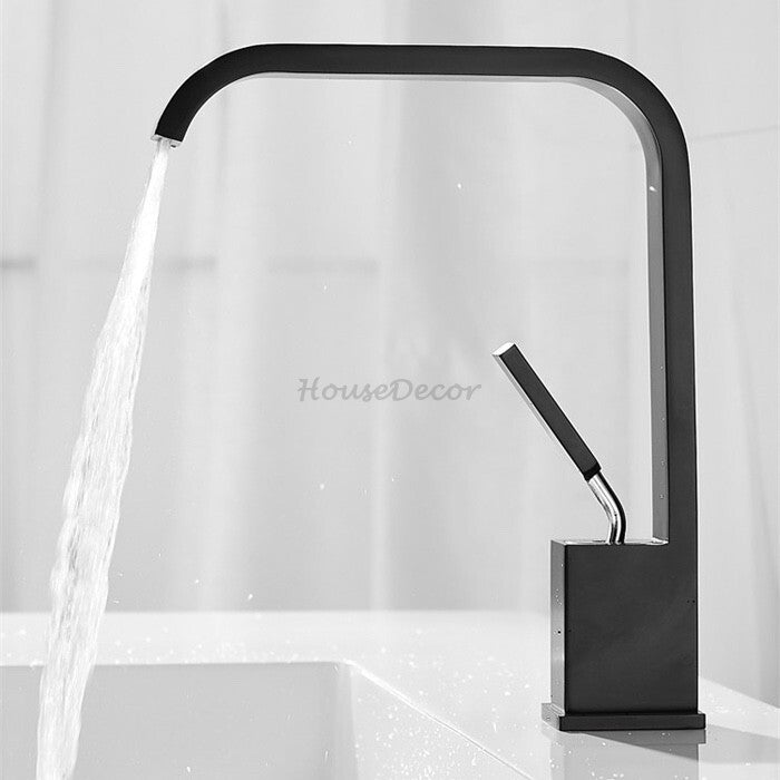 Modern bathroom basin mixer tap waterfall spout detail view
