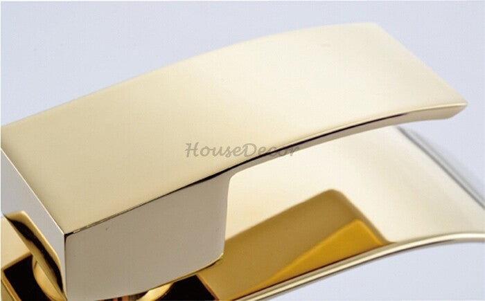 Gold bath shower mixer tap waterfall spout detail view