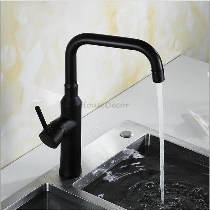 Modern kitchen sink mixer tap swivel spout detail view