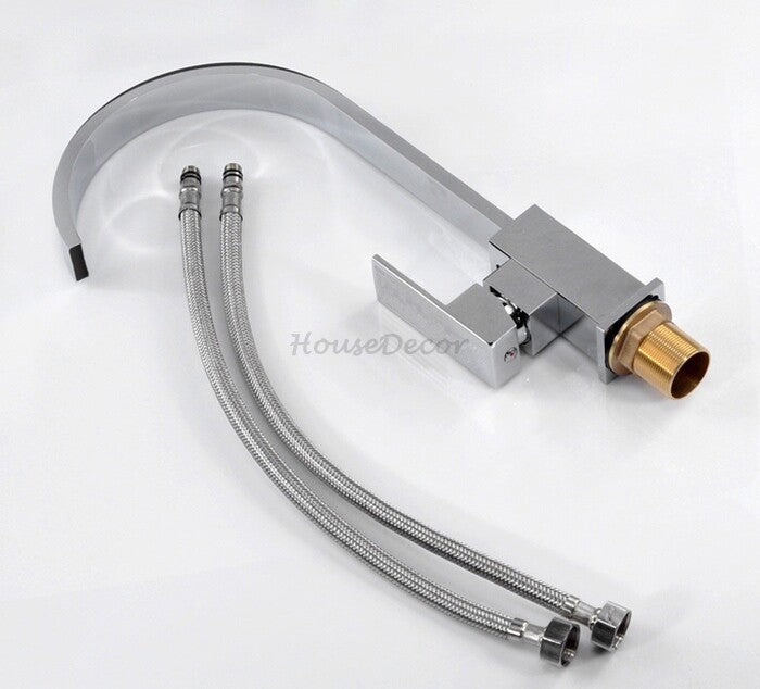 Chrome kitchen sink mixer tap swivel spout detail view