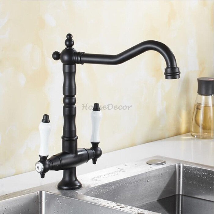 Black kitchen sink mixer tap swivel spout detail view