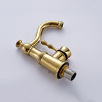 Gold bath shower mixer tap swivel spout detail view