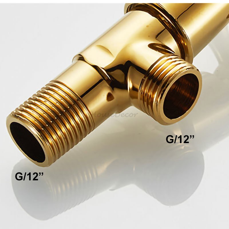 Gold faucet dual handle control detail view