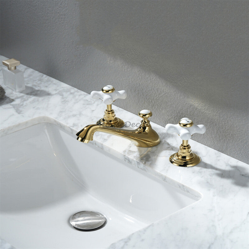 Brass bathroom basin mixer tap dual handle control detail view