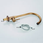 Modern kitchen sink mixer tap swivel spout detail view