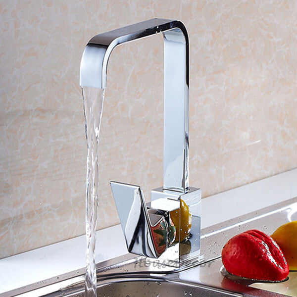 Chrome kitchen sink mixer tap swivel spout detail view