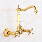 Gold kitchen sink mixer tap swivel spout detail view