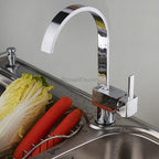 Modern kitchen sink mixer tap swivel spout detail view
