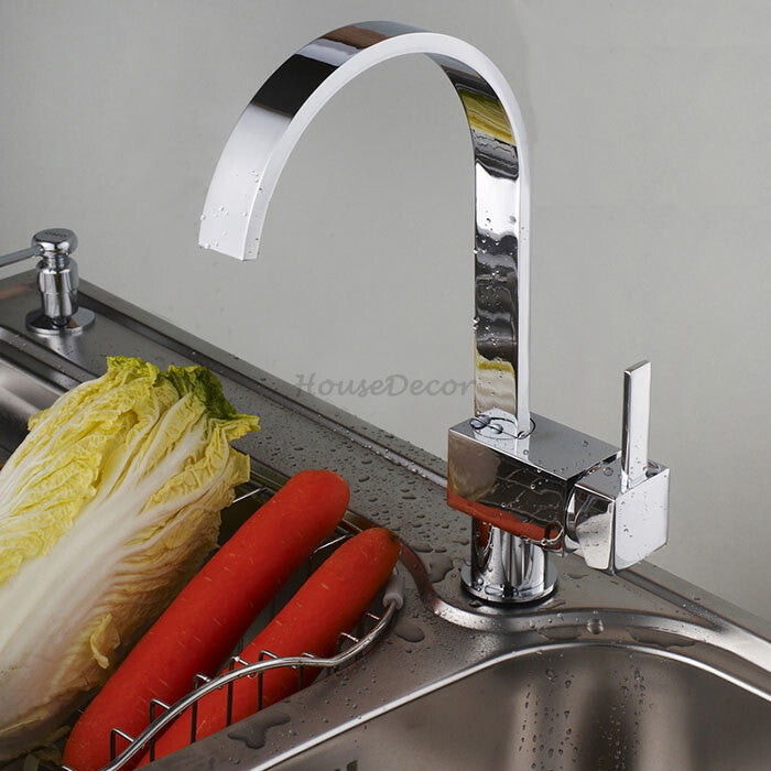 Modern kitchen sink mixer tap swivel spout detail view