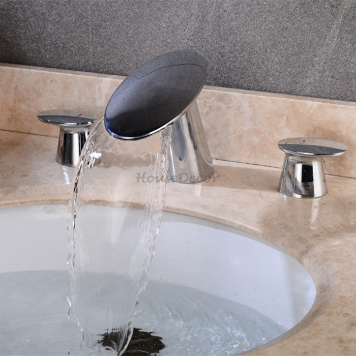 Modern bath shower mixer tap waterfall spout detail view