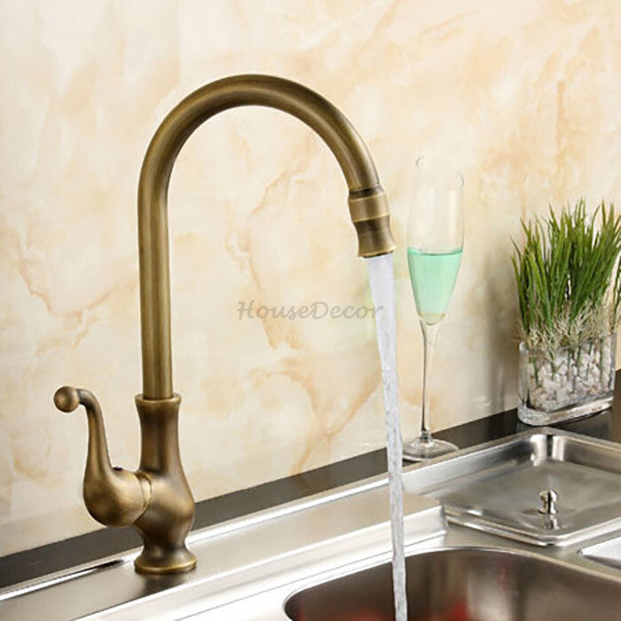Antique Brass kitchen sink mixer tap swivel spout detail view