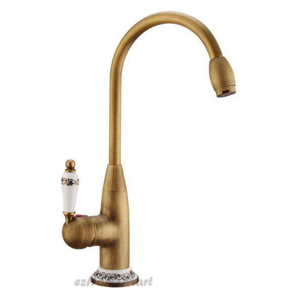 Antique Brass bathroom basin mixer tap swivel spout detail view