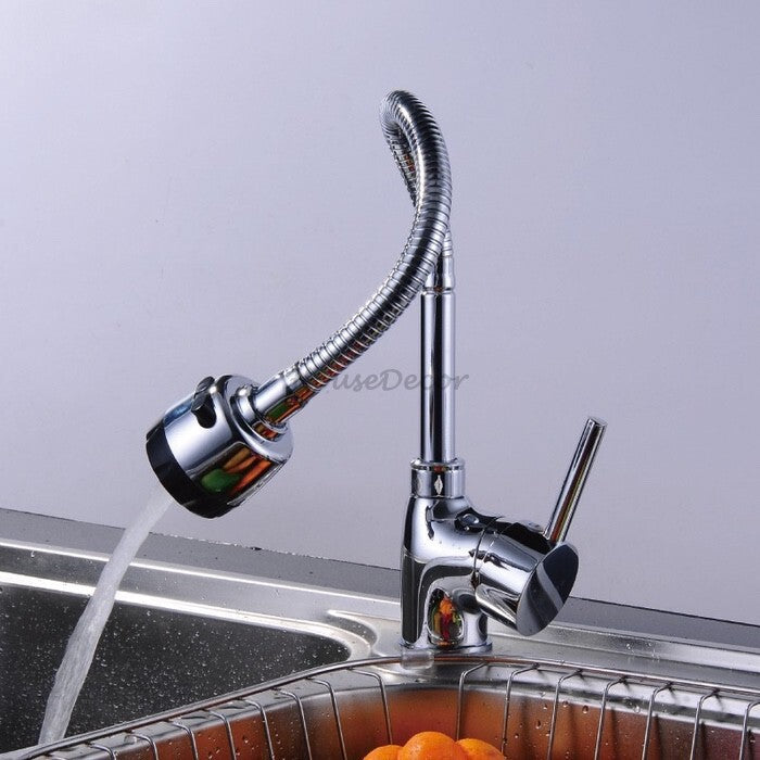 Chrome kitchen sink mixer tap swivel spout detail view