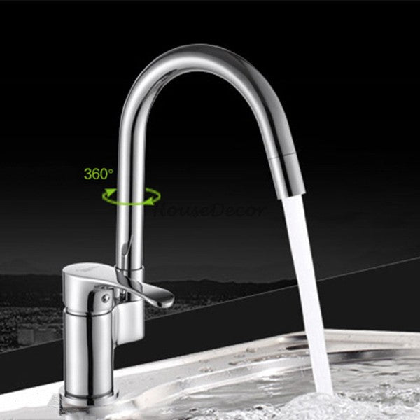 Modern kitchen sink mixer tap swivel spout detail view
