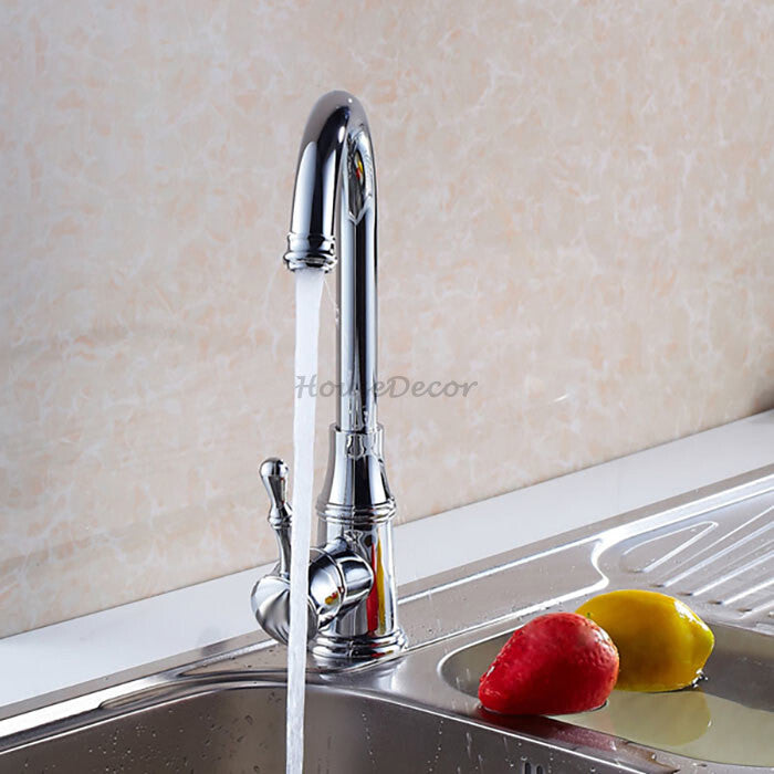 Chrome kitchen sink mixer tap swivel spout detail view