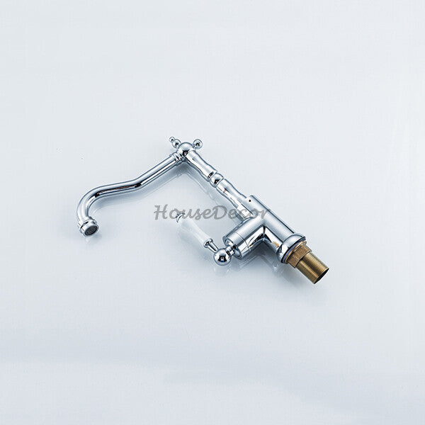 Chrome kitchen sink mixer tap swivel spout detail view
