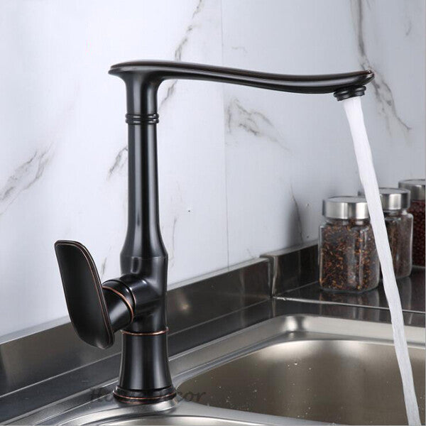 Modern kitchen sink mixer tap swivel spout detail view