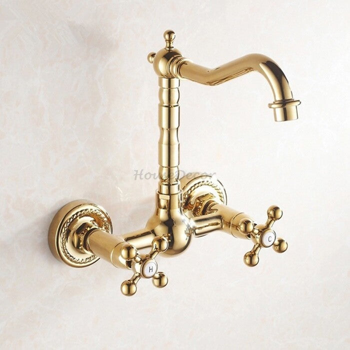 Gold kitchen sink mixer tap swivel spout main view