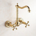 Gold kitchen sink mixer tap swivel spout main view