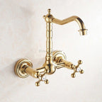 Gold kitchen sink mixer tap swivel spout main view