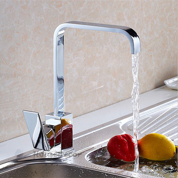 Chrome kitchen sink mixer tap swivel spout detail view