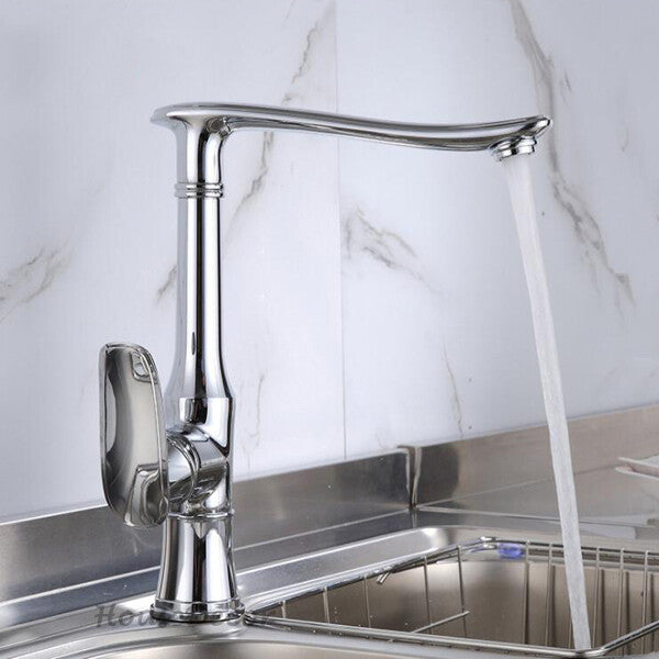 Modern kitchen sink mixer tap swivel spout detail view